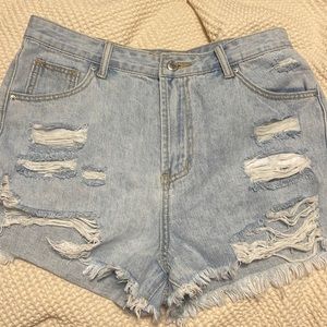 Distressed denim shorts